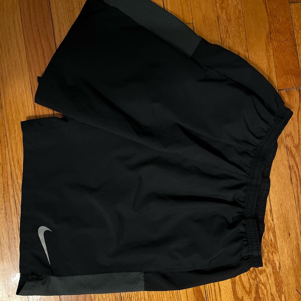 Size XL lined Nike dri-fit shorts. Black with grey accent color.